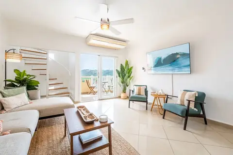 Living room — sofa + balcony — Penthouse El Mirador, Isabela, Puerto Rico