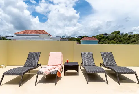 Rooftop terrace with sun loungers — Penthouse Vista Del Mar oceanfront rental in Isabela, Puerto Rico